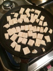 Slice tofu into thin pieces and toast them i na tawa on both sides by adding little oil.