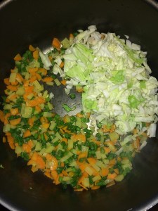 After a few mins of sauteing add the cabbage and cook for few mins until they get half cooked.