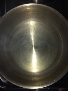 Take oil in a vessel. A bit more than usual as we are expecting the onion to get cooked in oil fully.