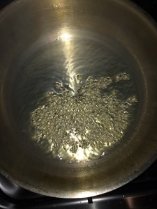 Temper mustard and urad dal.