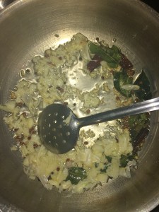 Now add the crushed garlic and allow it to cook for a minute. Don't brown them.